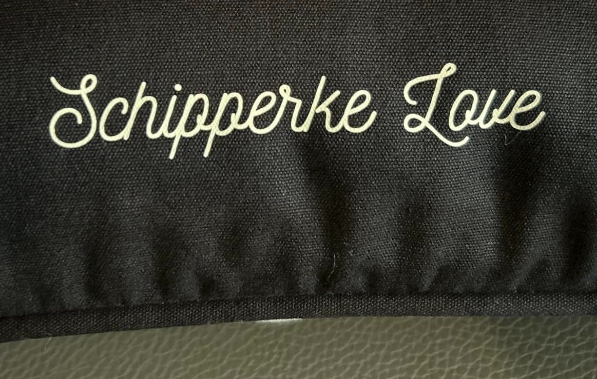 Coussin avec imprimé Schipperke en Flock